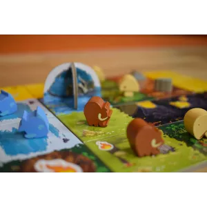 KINGDOMINO ORIGINSEN FAMILLE Dans Kingdomino Origins, tentez de dév...